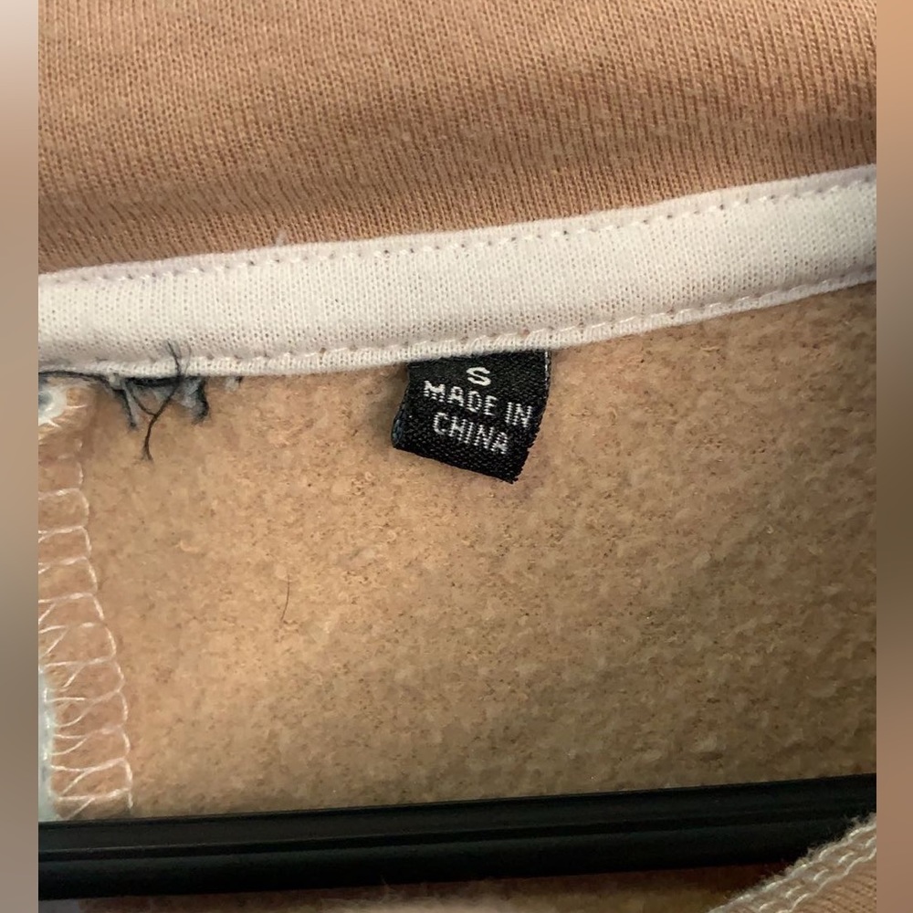 I am selling this hoodie with a picture of Rihanna on it